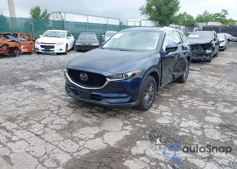 2021 Mazda Cx-5 Touring z USA, uszkodzony, nr VIN JM3KFBCM9M0497788